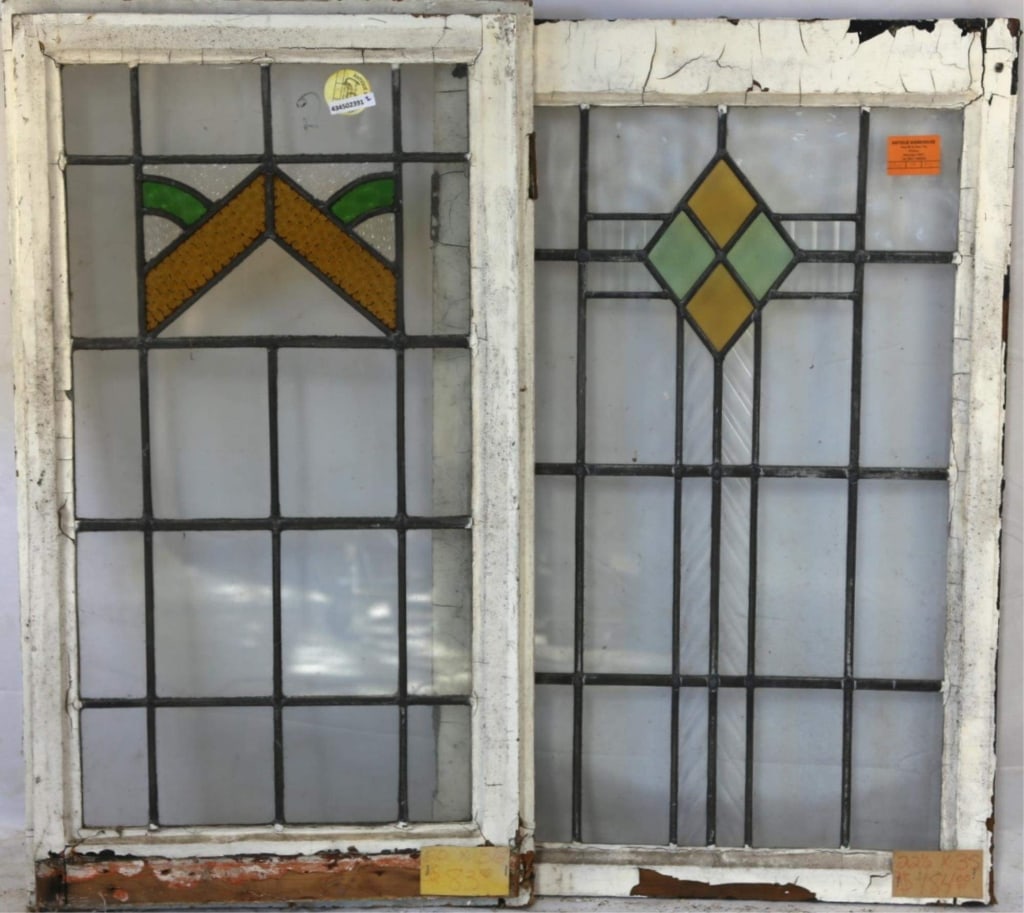 TWO CONTINENTAL STAINED GLASS PANELS: Two Continental stained glass panels. Approximate dimensions: h. 35", w. 22.5" Disclaimer: This is an online court ordered bankruptcy sale. Participating bidders must have a credit card on file with L