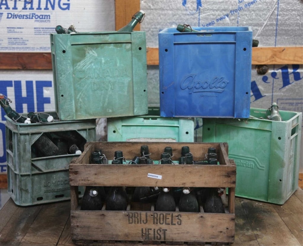 ANTIQUE FRENCH BEER & WINE BOTTLES: Six cases of antique French beer and wine bottles. Disclaimer: This is an online court ordered bankruptcy sale. Participating bidders must have a credit card on file with Live Auctioneers. Credit card