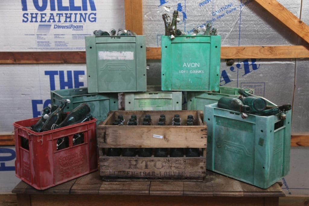 ANTIQUE FRENCH BEER & WINE BOTTLES: Eight cases of antique French beer and wine bottles. Disclaimer: This is an online court ordered bankruptcy sale. Participating bidders must have a credit card on file with Live Auctioneers. Credit ca