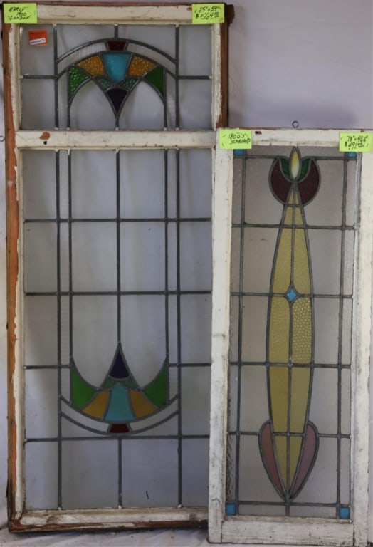 TWO CONTINENTAL STAINED GLASS PANELS: Two Continental stained glass panels with multicolored glass accents. Approximate dimensions: h. 59", w. 25" Disclaimer: This is an online court ordered bankruptcy sale. Participating bidders must hav