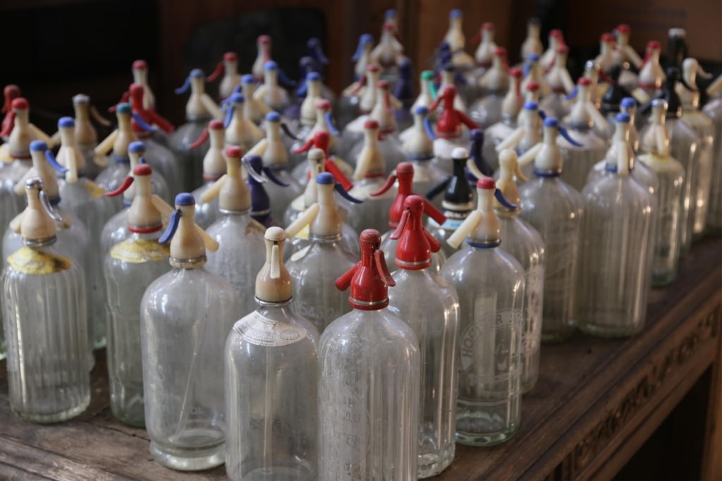 20 CASES OF ANTIQUE CONTINENTAL SELTZER BOTTLES: Twenty cases of antique Continental seltzer bottles. Disclaimer: This is an online court ordered bankruptcy sale. Participating bidders must have a credit card on file with Live Auctioneers. Credit ca