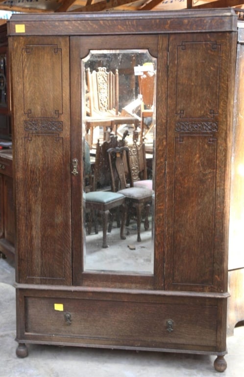 FRENCH ART NOUVEAU ARMOIRE: French Art Nouveau armoire with a beveled mirror and inset carved panels. Approximate dimensions: h. 76.5", w. 49", d. 19" Disclaimer: This is an online court ordered bankruptcy sale. Participating bi