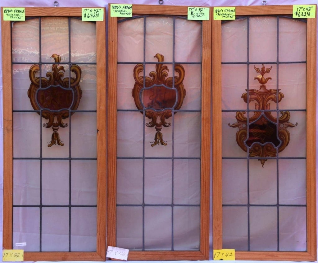 SET OF 3 ANTIQUE STAINED GLASS WINDOWS: Set of 3 antique stained glass windows. Approximate dimensions: h. 42", w. 17" Disclaimer: This is an online court ordered bankruptcy sale. Participating bidders must have a credit card on file with L