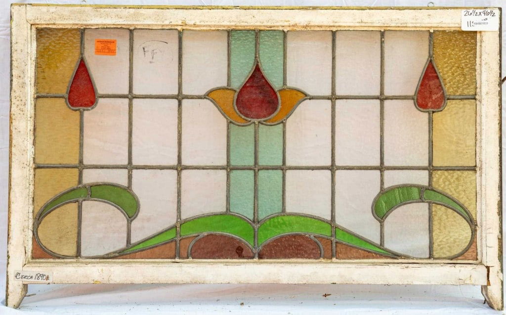 FRENCH ART NOUVEAU STAINED GLASS PANEL: French Art Nouveau stained glass panel with a floral motif. Approximate dimensions: h. 26.5", w. 46.5" Disclaimer: This is an online court ordered bankruptcy sale. Participating bidders must have a cr