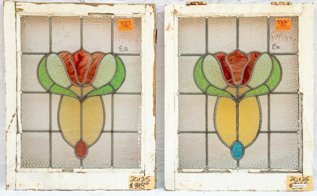 PAIR OF FRENCH ART NOUVEAU STAINED GLASS PANELS: Pair of French Art Nouveau stained glass panels with textured leaded stained glass panels and floral motif. Approximate dimensions: h. 25", w. 20" Disclaimer: This is an online court ordered bankruptc