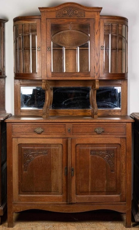 FRENCH ART NOUVEAU VITRINE BUFFET: French Art Nouveau vitrine buffet with beveled glass cabinet, mirrored backsplash, carved panels. Approximate dimensions: h. 82", w. 47", d. 19" Disclaimer: This is an online court ordered bankruptcy