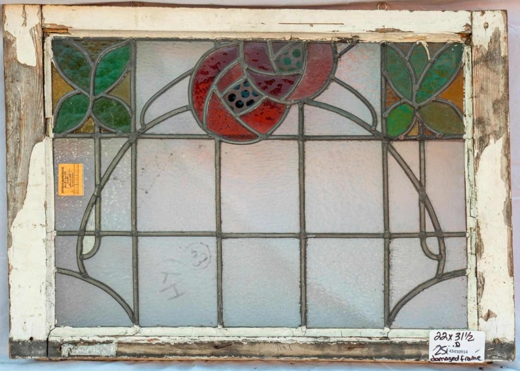 FRENCH ART NOUVEAU STAINED GLASS PANEL: French Art Nouveau stained glass panel with rose and leaf motif in stained glass. Approximate dimensions: h. 22", w. 31.5" Disclaimer: This is an online court ordered bankruptcy sale. Participating bi