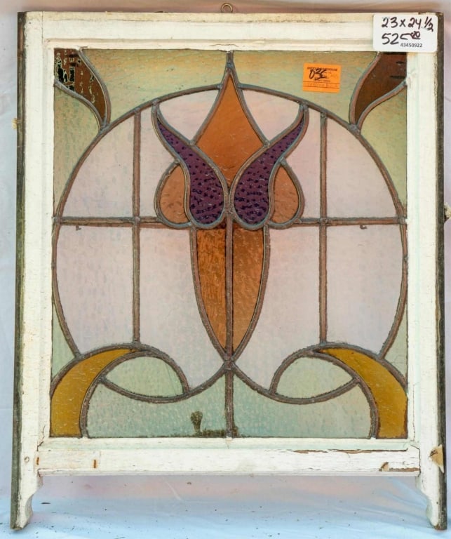 FRENCH ART NOUVEAU STAINED GLASS PANEL: French Art Nouveau stained glass panel with leaded glass panels in pink, green, amber, and purple. Approximate dimensions: h. 24.5", w. 23" Disclaimer: This is an online court ordered bankruptcy sale.