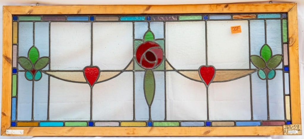 FRENCH ART NOUVEAU STAINED GLASS PANEL: French Art Nouveau stained glass panel with a red rose medallion and floral elements. Approximate dimensions: h. 26.5", w. 59" Disclaimer: This is an online court ordered bankruptcy sale. Participatin