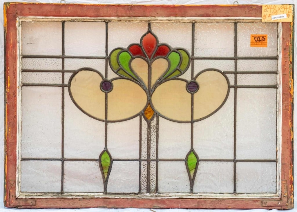 FRENCH ART NOUVEAU STAINED GLASS PANEL: French Art Nouveau stained glass panel with a floral motif. Approximate dimensions: h. 24", w. 34.5" Disclaimer: This is an online court ordered bankruptcy sale. Participating bidders must have a cred