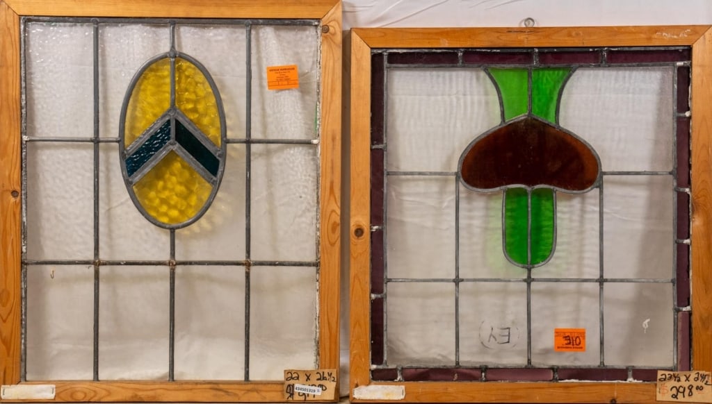 TWO CONTINENTAL STAINED GLASS PANELS: Two Continental stained glass panels. Approximate dimensions: h. 26.5", w. 22" Disclaimer: This is an online court ordered bankruptcy sale. Participating bidders must have a credit card on file with L