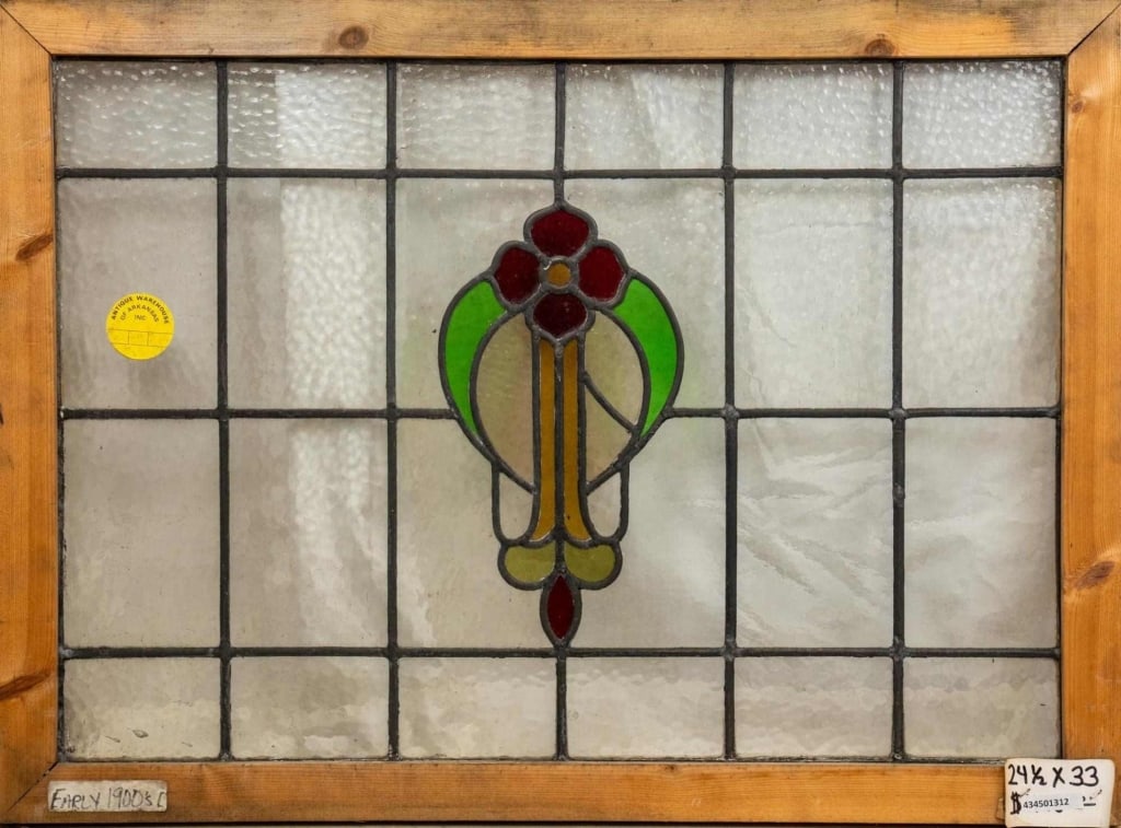 FRENCH ART NOUVEAU STAINED GLASS PANEL: French Art Nouveau stained glass panel with a floral medallion. Approximate dimensions: h. 24.5", w. 33" Disclaimer: This is an online court ordered bankruptcy sale. Participating bidders must have a