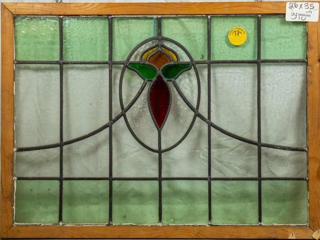 FRENCH ART NOUVEAU STAINED GLASS PANEL: French Art Nouveau stained glass panel with floral medallion. Approximate dimensions: h. 26", w. 35" Disclaimer: This is an online court ordered bankruptcy sale. Participating bidders must have a cred