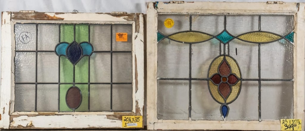 TWO ANTIQUE CONTINENTAL STAINED GLASS PANELS: Two antique Continental stained glass panels with floral motif. Approximate dimensions: h. 23", w. 27.5" Disclaimer: This is an online court ordered bankruptcy sale. Participating bidders must have a