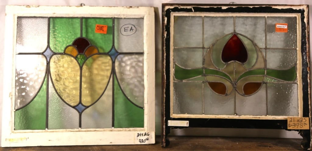 TWO CONTINENTAL ART NOUVEAU STAINED GLASS PANELS: Two Continental Art Nouveau stained glass panels with floral motif. Approximate dimensions: h. 24", w. 26" Disclaimer: This is an online court ordered bankruptcy sale. Participating bidders must have