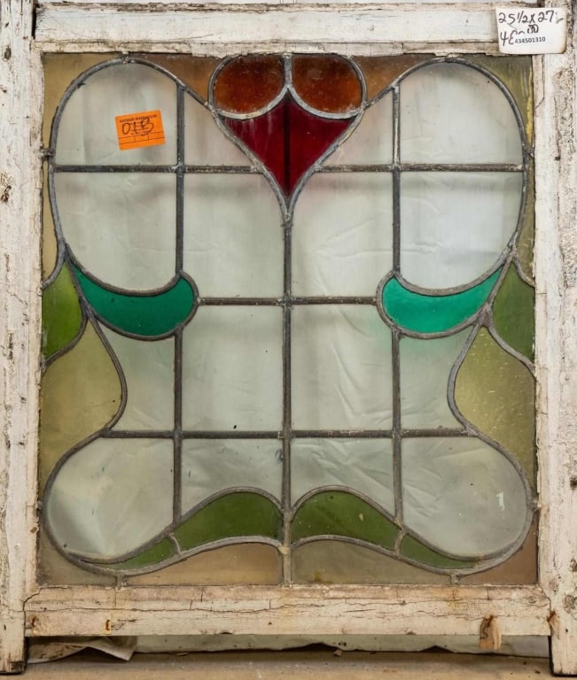 FRENCH ART NOUVEAU STAINED GLASS PANEL: French Art Nouveau stained glass panel with a floral motif. Approximate dimensions: h. 27", w. 25.5" Disclaimer: This is an online court ordered bankruptcy sale. Participating bidders must have a cred