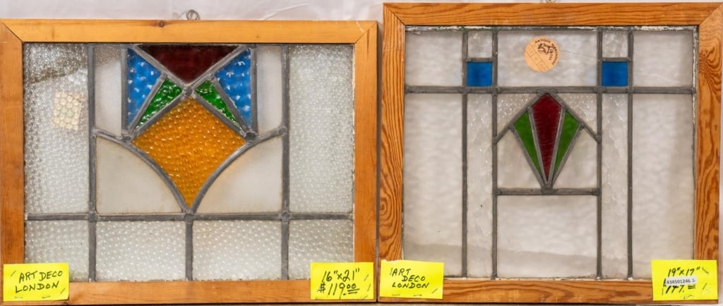TWO ENGLISH STAINED GLASS PANELS: Two English stained glass panels with geometric medallions and textured colorless and stained glass details. Approximate dimensions: h. 17", w. 19" Disclaimer: This is an online court ordered bankrupt