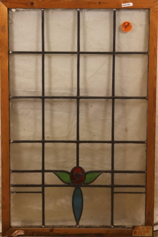 ANTIQUE CONTINENTAL STAINED GLASS PANEL: Antique Continental stained glass panel with floral medallion and colorless leaded glass panels. Approximate dimensions: h. 41", w. 26.5" Disclaimer: This is an online court ordered bankruptcy sale. P