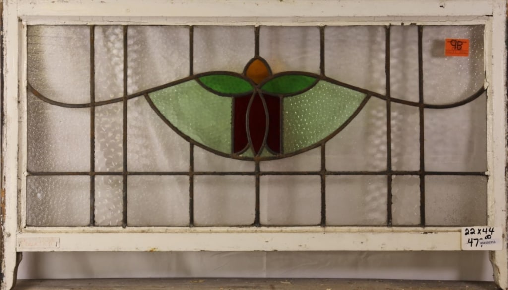FRENCH ART NOUVEAU STAINED GLASS PANEL: French Art Nouveau stained glass panel with floral medallion and colorless leaded glass panels. Approximate dimensions: h. 22", w. 44" Disclaimer: This is an online court ordered bankruptcy sale. Part