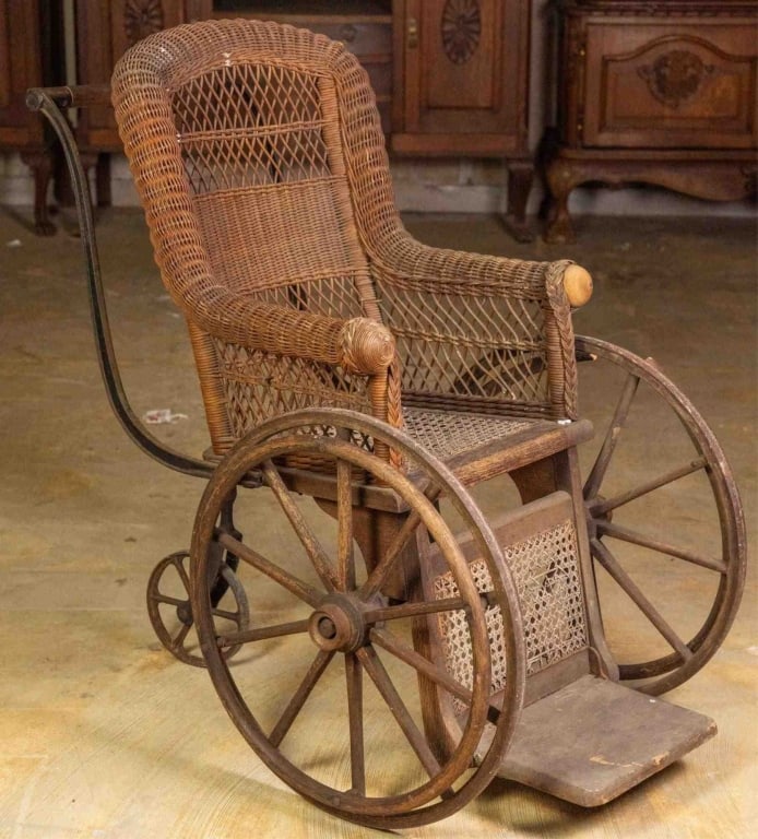 GEO F. SARGENT CO. VICTORIAN WHEELCHAIR: Geo. F. Sargent Co. Victorian wheelchair with cane seat. Approximate dimensions: h. 44", w. 22", d. 31" Disclaimer: This is an online court ordered bankruptcy sale. Participating bidders must have a c