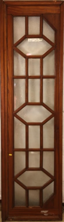 DUTCH ETCHED GLASS DOOR: Dutch etched glass door with etched and beveled floral motif panels in oak. Approximate dimensions: h. 80", w. 23" Disclaimer: This is an online court ordered bankruptcy sale. Participating bidders mu