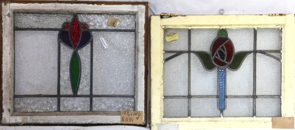 TWO CONTINENTAL STAINED GLASS PANELS: Two Continental stained glass panels with multicolored stained glass accents. Approximate dimensions: h. 19.75", w. 27.5" Disclaimer: This is an online court ordered bankruptcy sale. Participating bid