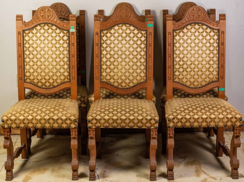 SET OF 6 FRENCH RENAISSANCE REVIVAL OAK CHAIRS: Set of 6 French Renaissance Revival oak chairs with nailhead trim accents, carved rosettes, and figural carved legs. Approximate dimensions: h. 45", w. 20", d. 18" Disclaimer: This is an online court 