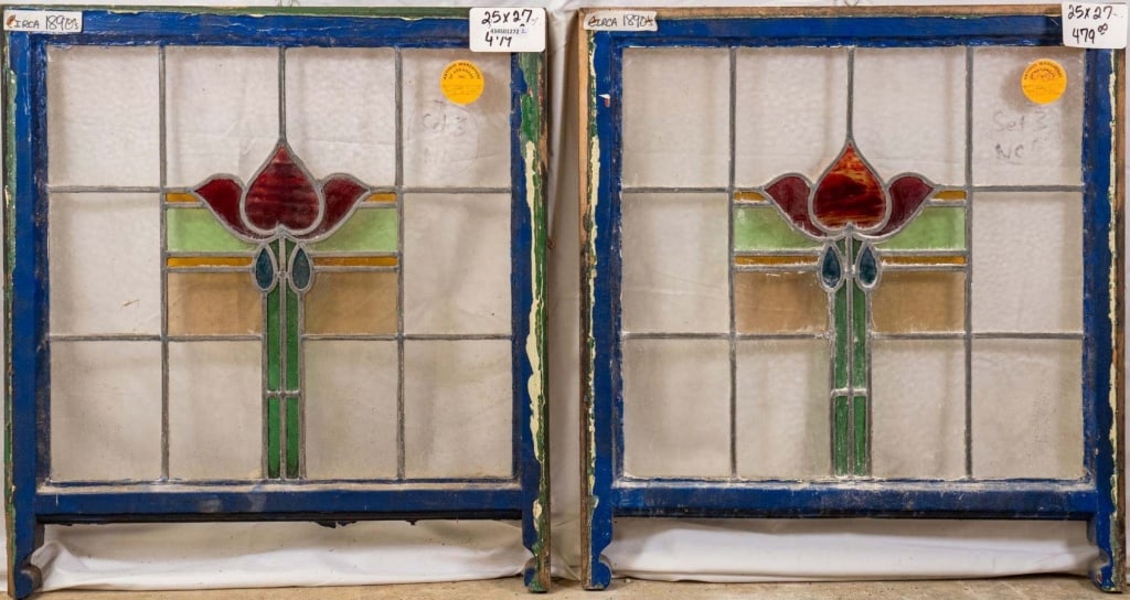 PAIR OF ANTIQUE CONTINENTAL STAINED GLASS PANELS: Pair of antique Continental stained glass panels with a floral motif. Approximate dimensions: h. 25", w. 27" Disclaimer: This is an online court ordered bankruptcy sale. Participating bidders must hav