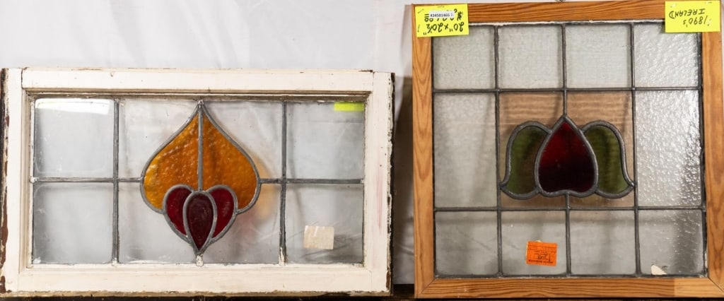 TWO CONTINENTAL STAINED GLASS PANELS: Two Continental stained glass panels with floral motif. Approximate dimensions: h. 20", w. 20" Disclaimer: This is an online court ordered bankruptcy sale. Participating bidders must have a credit car