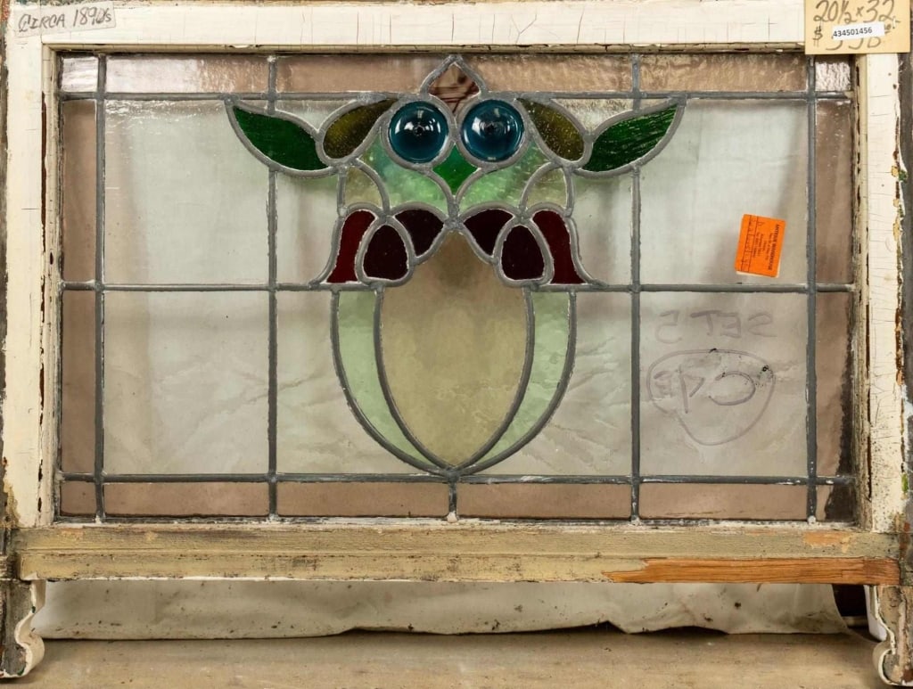 FRENCH ART NOUVEAU JEWELED STAINED GLASS PANEL: French Art Nouveau jeweled stained glass panel with a floral medallion and two blue jeweled details. Approximate dimensions: h. 20.5", w. 32" Disclaimer: This is an online court ordered bankruptcy sal