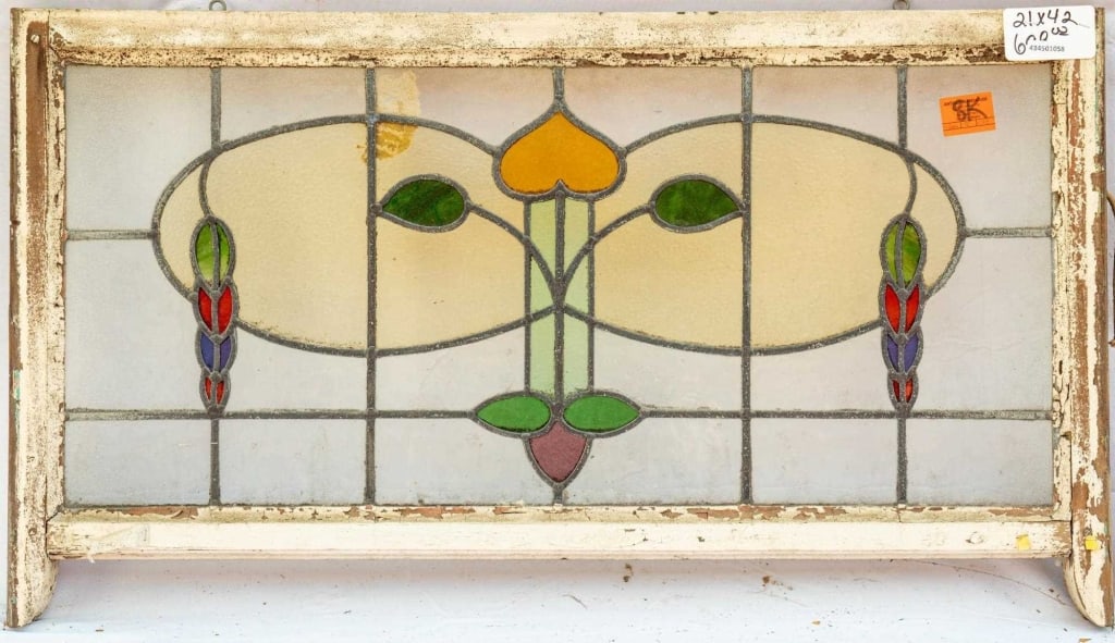 FRENCH ART NOUVEAU STAINED GLASS PANEL: French Art Nouveau stained glass panel with a heart-shaped leaf medallion. Approximate dimensions: h. 21", w. 42" Disclaimer: This is an online court ordered bankruptcy sale. Participating bidders mus