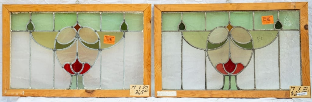 PAIR OF FRENCH ART NOUVEAU STAINED GLASS PANELS: Pair of French Art Nouveau stained glass panels with red, green, and amber floral details. Approximate dimensions: h. 17", w. 27" Disclaimer: This is an online court ordered bankruptcy sale. Participa