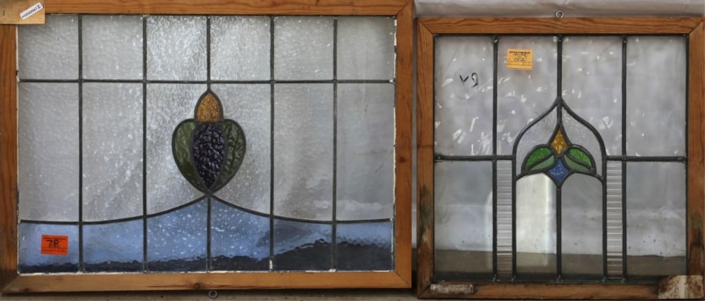 TWO ANTIQUE CONTINENTAL STAINED GLASS PANELS: Two antique Continental stained glass panels with floral and botanical motif. Approximate dimensions: h. 25", w. 32" Disclaimer: This is an online court ordered bankruptcy sale. Participating bidders