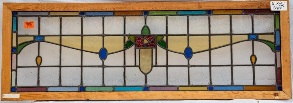 FRENCH ART NOUVEAU STAINED GLASS PANEL: French Art Nouveau stained glass panel with multicolored leaded stained glass panels and floral motif. Approximate dimensions: h. 21", w. 61" Disclaimer: This is an online court ordered bankruptcy sal