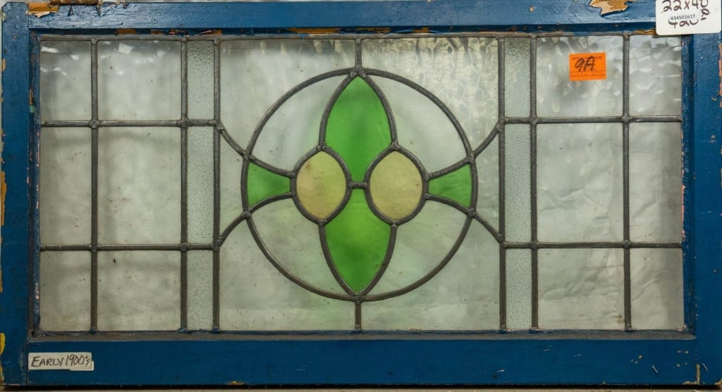 CONTINENTAL STAINED GLASS PANEL: Continental stained glass panel. Approximate dimensions: h. 22", w. 40" Disclaimer: This is an online court ordered bankruptcy sale. Participating bidders must have a credit card on file with Live Auc