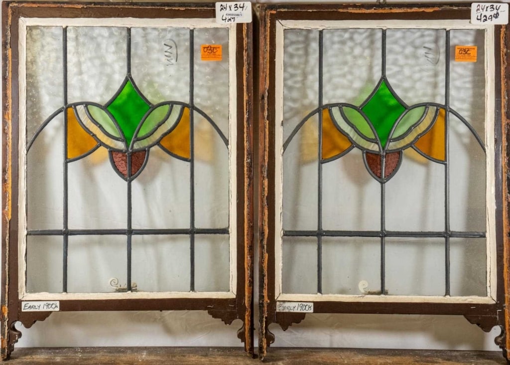PAIR OF ENGLISH STAINED GLASS PANELS: Pair of English stained glass panels. Approximate dimensions: h. 34", w. 24" Disclaimer: This is an online court ordered bankruptcy sale. Participating bidders must have a credit card on file with Liv