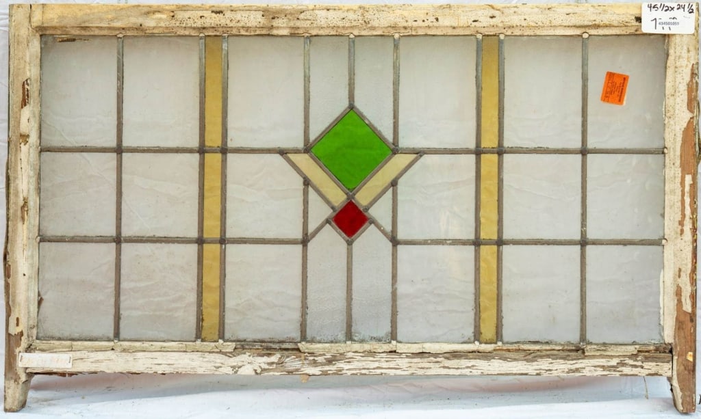 FRENCH ART DECO STAINED GLASS PANEL: French Art Deco stained glass panel with a geometric medallion. Approximate dimensions: h. 24.5", w. 45.5" Disclaimer: This is an online court ordered bankruptcy sale. Participating bidders must have