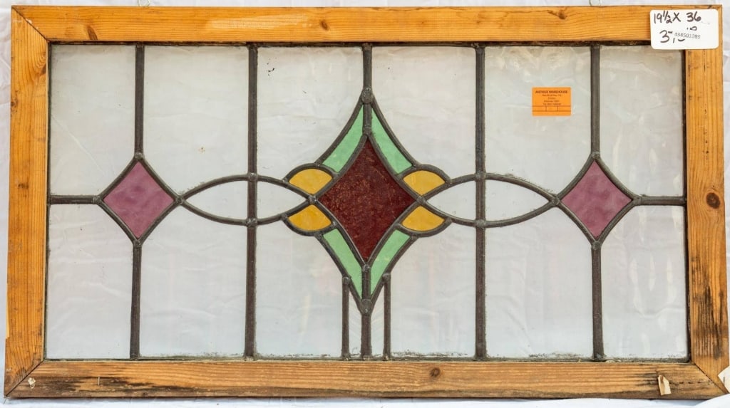 FRENCH ART NOUVEAU STAINED GLASS PANEL: French Art Nouveau stained glass panel with multicolored stained glass medallion. Approximate dimensions: h. 19.5", w. 36" Disclaimer: This is an online court ordered bankruptcy sale. Participating bi