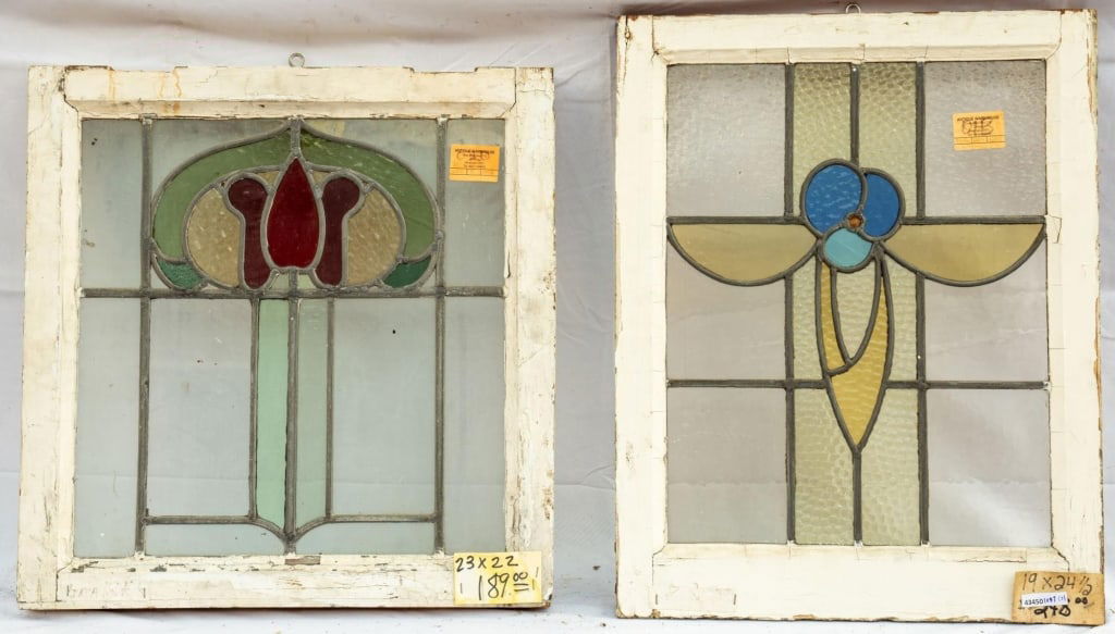 TWO FRENCH ART NOUVEAU STAINED GLASS PANELS: Two French Art Nouveau stained glass panels with floral motif. Approximate dimensions: h. 19", w. 24.5" Disclaimer: This is an online court ordered bankruptcy sale. Participating bidders must have a c