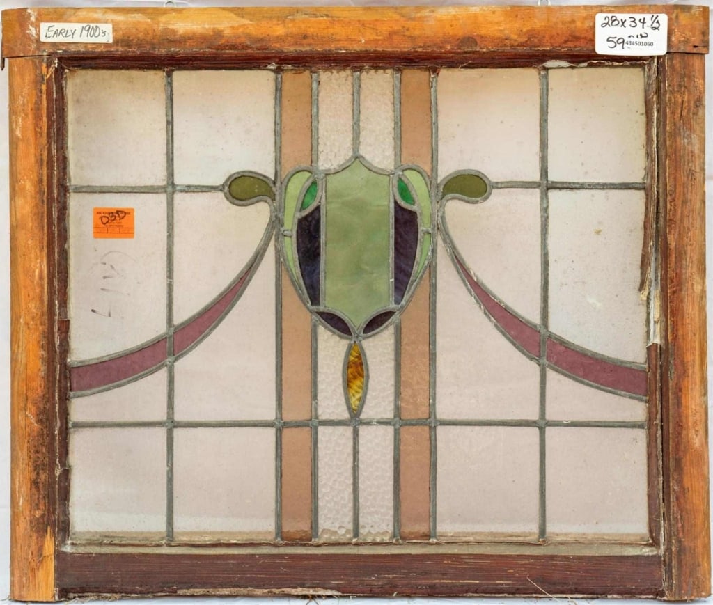 FRENCH ART NOUVEAU STAINED GLASS PANEL: French Art Nouveau stained glass panel with floral and ribbon motif. Approximate dimensions: h. 28", w. 34.5" Disclaimer: This is an online court ordered bankruptcy sale. Participating bidders must ha