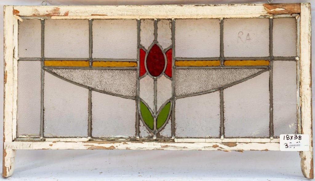 FRENCH ART NOUVEAU STAINED GLASS PANEL: French Art Nouveau stained glass panel composed of a central flower stained glass medallion. Approximate dimensions: h. 18", w. 38" Disclaimer: This is an online court ordered bankruptcy sale. Partici