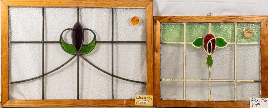 TWO ANTIQUE CONTINENTAL STAINED GLASS PANELS: Two antique Continental stained glass panels with floral motif. Approximate dimensions: h. 20.5", w. 29.5" Disclaimer: This is an online court ordered bankruptcy sale. Participating bidders must have