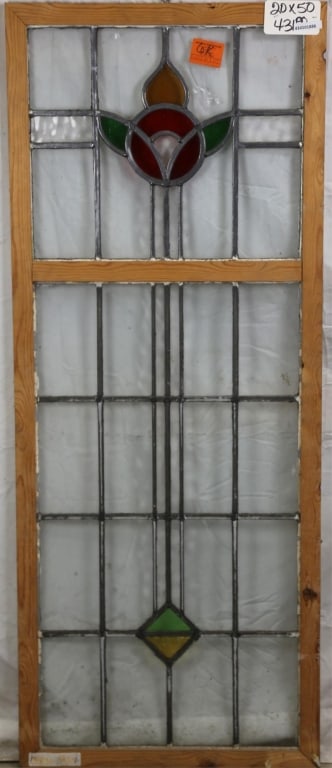 CONTINENTAL ART DECO STAINED GLASS PANEL: Continental Art Deco stained glass panel with floral medallion and geometric details on colorless leaded glass panels. Approximate dimensions: h. 50", w. 20" Disclaimer: This is an online court ordere