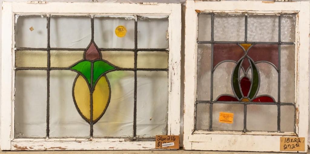 TWO ANTIQUE CONTINENTAL STAINED GLASS PANELS: Two antique Continental stained glass panels with floral motif. Approximate dimensions: h. 21.5", w. 26" Disclaimer: This is an online court ordered bankruptcy sale. Participating bidders must have a 