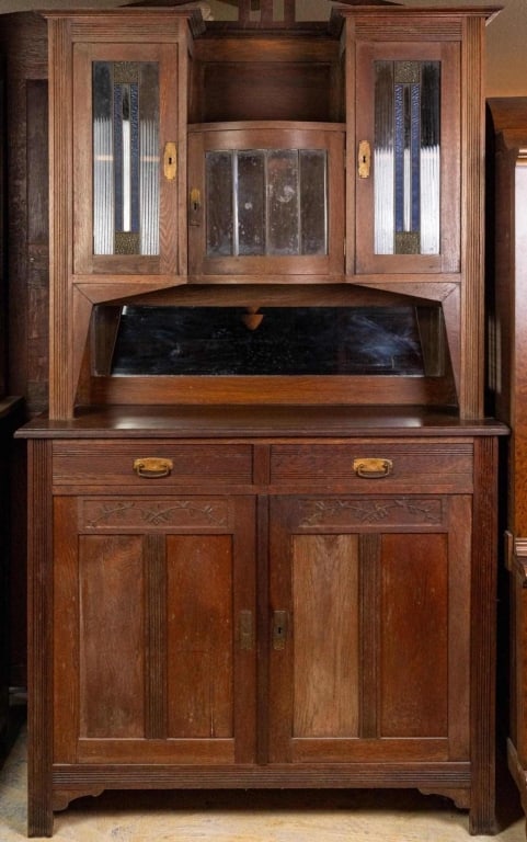 FRENCH ART DECO STAINED GLASS BUFFET: French Art Deco stained glass buffet with fine carved accents. Approximate dimensions: h. 88", w. 47", d. 19.5" Disclaimer: This is an online court ordered bankruptcy sale. Participating bidders must
