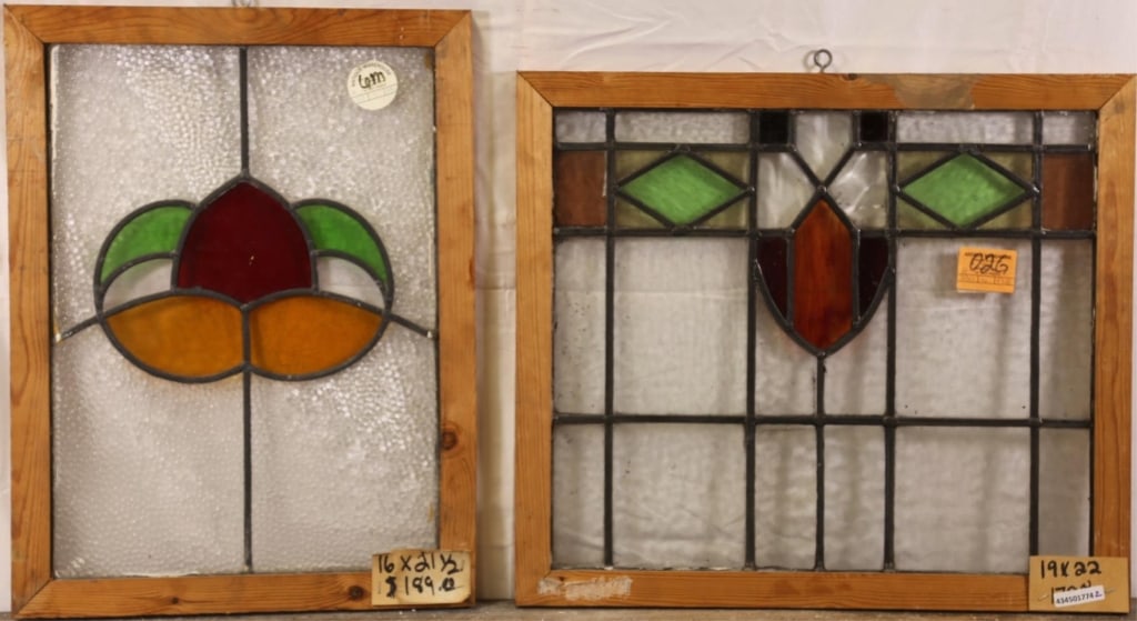 TWO ANTIQUE CONTINENTAL STAINED GLASS PANELS: Two antique Continental stained glass panels with multicolored accents. Approximate dimensions: h. 19", w. 32" Disclaimer: This is an online court ordered bankruptcy sale. Participating bidders must h