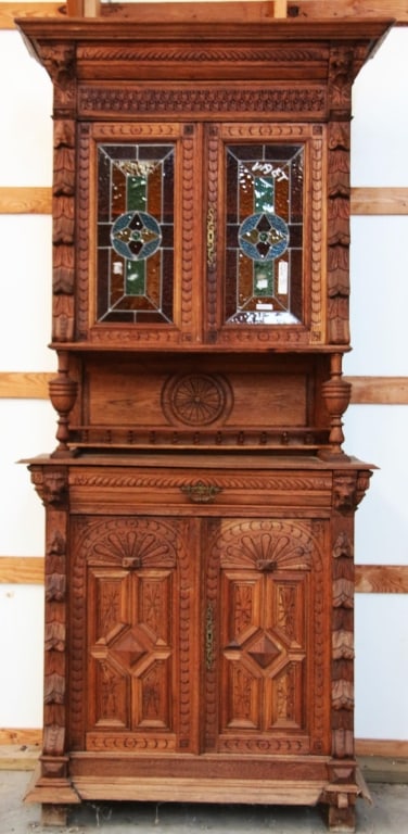 FRENCH RENAISSANCE REVIVAL STAINED GLASS BUFFET: French Renaissance Revival stained glass buffet with stained glass panels with jeweled accents, carved rosette, gallery and supports, and elaborate carving throughout. Approximate dimensions: h. 88",