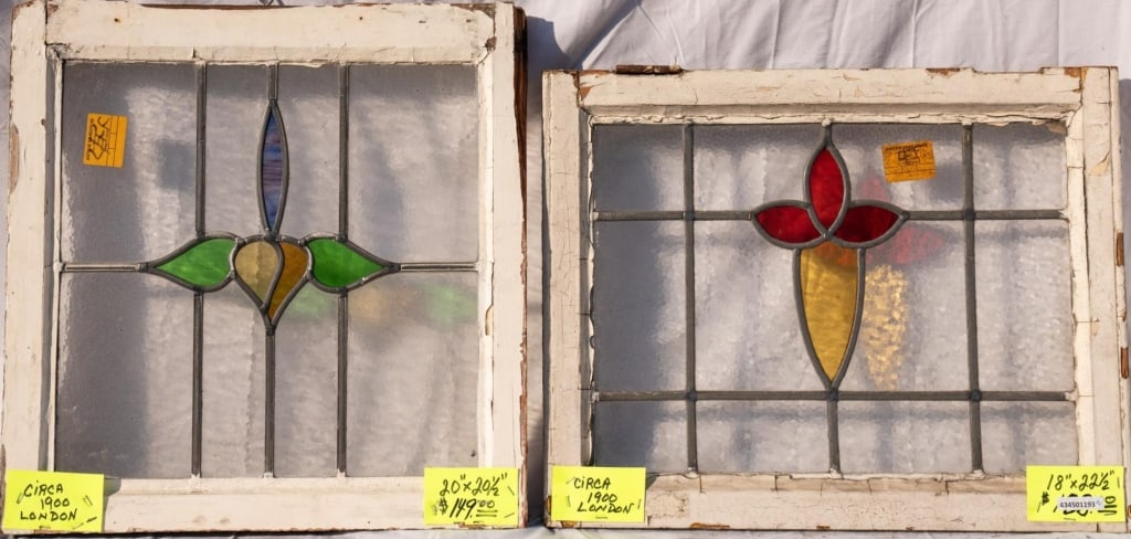 TWO FRENCH ART NOUVEAU STAINED GLASS PANELS: Two French Art Nouveau stained glass panels with floral medallions. Approximate dimensions: h. 18", w. 22.5" Disclaimer: This is an online court ordered bankruptcy sale. Participating bidders must hav