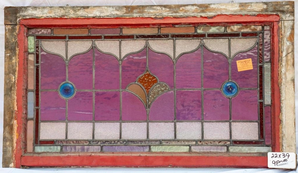 FRENCH ART NOUVEAU JEWELED STAINED GLASS PANEL: French Art Nouveau jeweled stained glass panel with blue jeweled details and multicolored stained glass insets. Approximate dimensions: h. 22", w. 39" Disclaimer: This is an online court ordered bankr