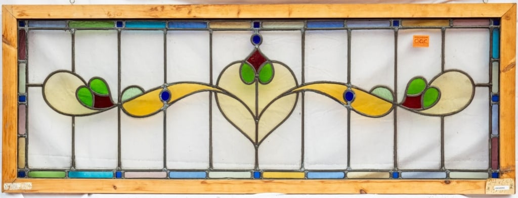 FRENCH ART NOUVEAU STAINED GLASS PANEL: French Art Nouveau stained glass panel with elaborate multicolored stained glass insets. Approximate dimensions: h. 24", w. 64" Disclaimer: This is an online court ordered bankruptcy sale. Participati